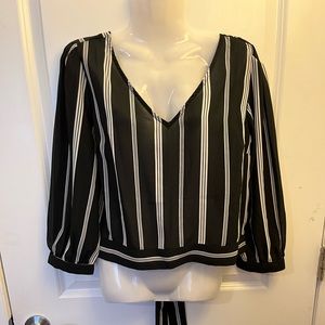 Sheer short waisted top with opening in back and tie